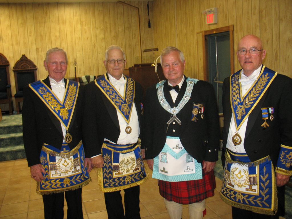 Left to Right: R.W. Bro Ken Pierce, R.W. Bro. Robert McLean, New Worshipful Master of Elliot Lake Lodge No. 698 for 2016 / 2017 R.W. Bro. Norm Mathie and R.W. Bro. Henry Lewis DDGM 2015 /2016