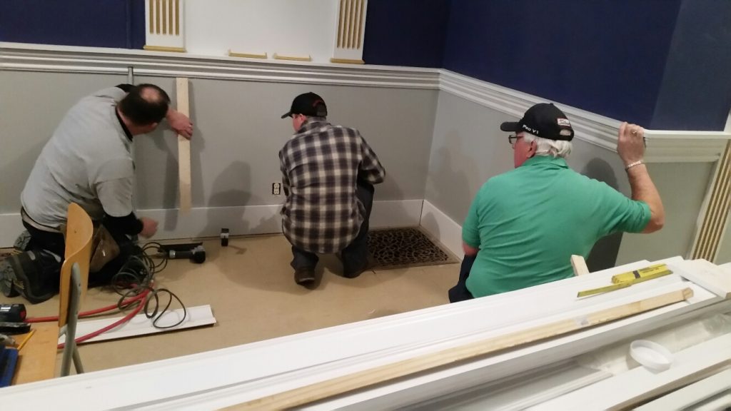 Installing Baseboard Left to right: Bro. Russell Joncas (Rusty), Bro. Bobby Jensen and R.W. Bro. Brian Olson